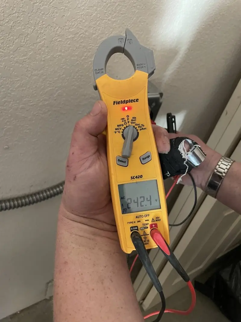 Voltage testing with clamp meter during Aluminum Wiring Replacement in Knoxville